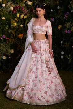 Ivory modal satin lehenga with an attached cancan, floral block print and gota and thread embroidery. Comes with a padded blouse and an organza dupatta. - Aza Fashions White Silk Choli With Floral Embroidery, White Silk Lehenga With Resham Embroidery, White Silk Choli With Intricate Embroidery, White Art Silk Floor-length Dress, White Floor-length Art Silk Dress, White Art Silk Dress For Wedding, White Art Silk Lehenga For Wedding, White Anarkali Lehenga With Floral Print, White Art Silk Lehenga With Sheer Dupatta