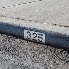 there is a street sign on the side of the road that says'350 '