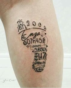 a person with a tattoo on their leg that has numbers and words written in it