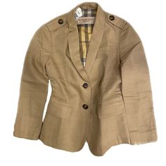 Beige. Linen. Full Sleeves Button Cuffs. Lightweight. Form Fitting Designer Spring Blazer With Buttons, Designer Spring Blazer With Button Closure, Designer Spring Blazer With Button Cuffs, Double-breasted Khaki Outerwear With Button Cuffs, Designer Spring Button-up Blazer, Khaki Double-breasted Outerwear With Button Closure, Beige Double-breasted Blazer With Double Button Closure, Burberry Jacket, Linen Blazer