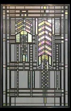 an art deco glass door with geometric designs