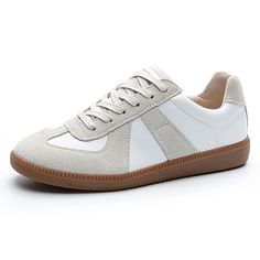 Discover the perfect blend of fashion and function with our Genuine Leather Women's Casual Sneakers. Featuring a chic silver design and lace-up closure, these sneakers are ideal for everyday style and comfort. Shop now! Trendy Gray Sneakers With Flat Heel, White High-top Lace-up Shoes For Streetwear, Trendy Gray Lace-up Sneakers, White Platform Sneakers With Elastic Laces And Round Toe, White Lace-up Platform Sneakers With Elastic Laces, Trendy Gray Sneakers With Laces, Silver Sneakers With Laces For Spring, White Round Toe Lace-up Shoes For Streetwear, Casual Leather Platform Sneakers With White Laces