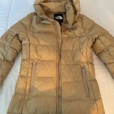 North Face Metropolis Parka Iii Preowned In Great Condition, Cleaned. Color Is Tan, A Great Neutral That Goes With Everything! 33 Inch Long Front And 35 Inch Long Back. North Face Metropolis Parka, Beige Puffer Jacket, Beige Puffer, Face Tan, Tan Face, The North Face Jackets, North Face Jackets, North Face Jacket, Metropolis