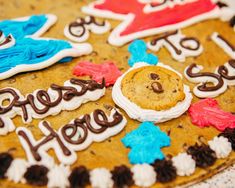 there is a cookie decorated with cookies and icing