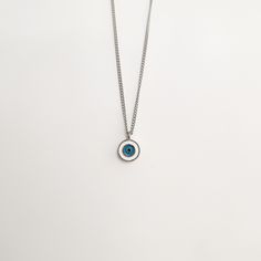 ♢ ABOUT THE JEWELLERY Tiny Greek Evil Eye . Made of 925 Sterling Silver. The chain comes with the pendant.  The evil eye is a curse believed to be cast by a malevolent glare, usually given to a person when they are unaware. Many cultures believe that receiving the evil eye will cause misfortune or injury. Talismans created to protect against the evil eye and give good luck and prosperity to ones who wear them. ♢ FEATURES & MATERIALS  :: The diameter of the pendant is 8mm (0.31") :: Made of 925 S Silver Tarnish Resistant Round Chain Necklace, Silver Chain Round Jewelry For Gift, Silver Circle Charm Necklace With Adjustable Chain, Sterling Silver Circle Necklaces Tarnish Resistant, Tarnish Resistant Sterling Silver Circle Necklaces, Silver Round Chain Necklace Gift, Handmade White Gold Stainless Steel Necklace, Round Stainless Steel Chain Necklace Gift, Sterling Silver Round Charm Necklaces Tarnish Resistant