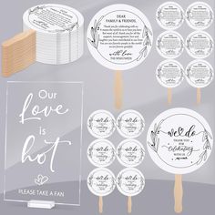 the wedding party favors are shown with popsticks and place cards for each guest