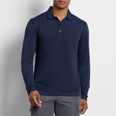 This Seamless club polo is a great essential to wear during the colder months. The fabric is designed with a seamless knit construction to provide an elegant design. Made of quick dry, moisture wicking fabric to wick moisture away from your body, instead of absorbing it. This seamless polo is engineered with sun-protective properties, giving you additional protection against UV radiation. It's designed to absorb or block a high percentage of sun rays. The collar is designed with a rib technique Van Heusen, Long Sleeve Polo Shirt, Sun Rays, Long Sleeve Polo, Mens Polo Shirts, Polo Shirts, Moisture Wicking Fabric, Quick Dry, Elegant Design