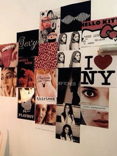 the wall is covered with many different posters