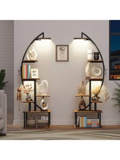 a living room filled with furniture next to a wall mounted book shelf covered in books