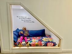 Under the stairs reading nook  #nook #readingnook #interiordesignideas Under The Stairs Reading Nook, Reading Nook Under Stairs, Stairs Reading Nook, Bed Reading Nook, Stair Nook, Indoor Playroom, Under The Stairs, Under Stairs, Affordable Furniture