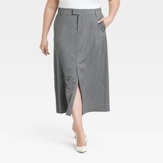 Move through your busy day in confident style in these Tailored Midi Skirt from A New Day™. Fashioned in a midi length, this mid-rise skirt made from midweight fabric with added stretch make a comfy addition to your wardrobe. It's designed with a fly zipper with back elastic for a secure fit and customizable wear. Boasting classic pinstripe pattern in gray, it pairs well with a wide range of tops for versatile styling. A New Day™: Style that goes wherever you do. Spring Gray Midi Skirt, Affordable Non-stretch Midi Skirt, Medium Wash Non-stretch Cotton Skirt, Spring Gray Midi-length Skirt, Grey Knit Midi Skirt, Midi Sweater Skirt, Faux Leather Midi Skirt, Confident Style, Leather Midi Skirt