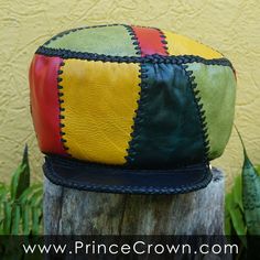 Size LARGE / Height 6 inches Rim 56 cm or 22 inches (to go over your head) Rasta Leather Hat made from variations of Red Gold Green and Blue leather. GENUINE LEATHER RASTA CROWN Prince Crown Hand Crafted Rasta Hat made from Genuine Designer Leather ☼ Hand Crafted and Hand Stitched ☼ 100% Leather exterior and lacing ☼ Stylish and useful, versatile and comfortable. ☼ Product of Jamaica, made in Jamaica by Jamaicans Pick one to fit your personality, your wardrobe... or gift one to someone special a Rasta Hat, Leather Crown, Prince Crown, Leather Hat, Hat Handmade, Leather Hats, Leather Cap, Handcrafted Leather, Color Textures