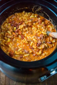 a crock pot filled with macaroni and cheese