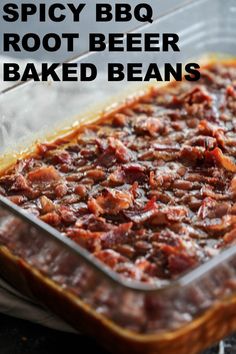 a casserole dish filled with baked beans and bbq root beer in it