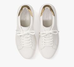 we call these our lift sneakers for a reason: the platform midsoles will add a little bit of height plus the supple nappa leather with pops of print and color will instantly elevate any outfit you pair them with. | Kate Spade Lift Sneakers, Optic White/Pale Gold - 11 Kate Spade Lace-up Sneakers With Branded Insole, Kate Spade White Low-top Sneakers, Kate Spade Casual Low-top Sneakers, Kate Spade White Sneakers For Spring, White Kate Spade Sneakers For Spring, Pale Gold, For A Reason, Nappa Leather, Kate Spade New York