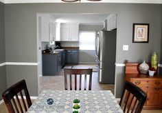 a dining room table and chairs in a kitchen