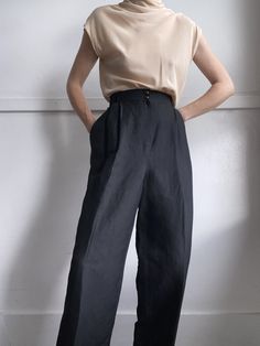 "gorgeous pair of lined,  high waisted black linen trousers with pockets & belt loops, tapered wide, roomy leg, by harvé benard condition: excellent material: linen / rayon care: dry clean or hand wash size: US 12, works for a 10/12 model is 5'9\" and wears a modern 6/8, pants are clipped to back in image and fall at hip bone when unclipped for relaxed fit measurements waist: 30 in hips: 42 in rise: 13 in length: 43 in" High Waisted Tapered Pants, Linen Wide Leg Pants With Belt Loops For Work, Linen Wide-leg Office Pants, Elegant Linen Wide Leg Pants With Belt Loops, Business Casual High Waist Linen Wide Leg Pants, High Waist Linen Wide Leg Pants For Business Casual, Spring Office Linen Wide Leg Pants, Chic Black Linen Bottoms, Spring Linen Wide Leg Pants For Office