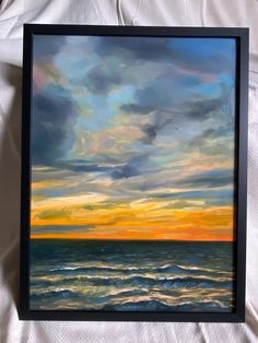 an oil painting of a sunset over the ocean