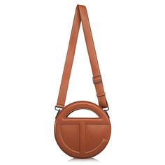 Modern Tan Satchel With Detachable Strap, Modern Tan Shoulder Bag With Detachable Handle, Modern Tan Shoulder Bag With Adjustable Strap, Designer Tan Satchel With Adjustable Strap, Modern Tan Crossbody Satchel, Modern Tan Shoulder Bag With Detachable Strap, Modern Tan Satchel, Tan Top Handle Satchel With Adjustable Strap, Modern Tan Shoulder Bag With Top Carry Handle