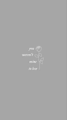 a white rose on a gray background with the words you weren't mine to love