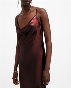 Meet our statement slip dress, this is the Hadley. Crafted from an elegantly draped satin with a seasonal metallic sheen, it's shaped to flatter with a slight cowl neck, side split and adjustable straps. It's giving 90s vibes – try it dressed up with heels or underneath slouchy knitwear for a casual look.  This dress is designed to a relaxed fit Pullover Cowl neck Adjustable straps Curve hem Side split Layered T Shirt, 90s Vibes, Midi Slip Dress, Slim Fit Casual Shirts, Nightwear Women, Cocktail Parties, Chunky Knitwear, Newborn Dresses, Guest Outfit