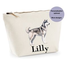 a white bag with a dog on it and the words lilly written in black ink