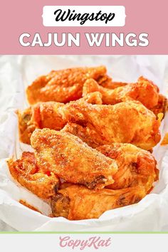 chicken wings with text overlay that reads wingstop cajun wings