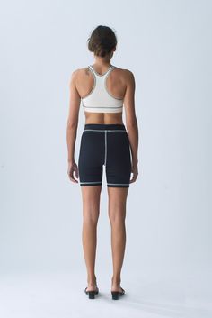 Our Organic Cotton Sport Bra provides full coverage, comfort and support for all activities. Finished with a racer back and 1 1/4 inch encased elastic hem. The Organic Cotton Sport Bra is manufactured in New York City. Fit notes – The Organic Cotton Sport Bra fits true to size, we recommend to take your normal size in a bra or sports bra style. Please follow measurements below to understand sizing. All measurements are in inches before stretch. Recommended Bra Sizing Across Chest Lying Flat (Pit Sporty Racerback Activewear With Built-in Padding, Sporty T-back Activewear For Training, Sporty Fitted T-back Sports Bra, Sporty Activewear With Built-in Padding And T-back, Functional T-back Activewear For Training, Technical High-stretch Activewear For Sports Events, Sporty T-back Sports Bra With Built-in Padding, Sporty High Stretch Activewear For Sports Events, Sporty Activewear For Sports Events