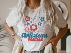 a woman wearing an american t - shirt with the words'america the beautiful'on it