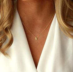 Tiny Cursive Initial Charm Necklace.   Modern, Simple & Delicate Initial Necklace that layers just right with her favorite every day jewelry pieces.   Affordable personalized jewelry for every style and occasion.     D E T A I L S  ● Available in gold plated, silver plated or rose gold plated ● Model is wearing 16" (model wears size small blouse for sizing reference) ● 2 inch extender chain included with necklace ● If you'd like necklace made without extender chain, please leave a note at checko Arabic Necklace, Valentine Gift For Wife, Handwriting Necklace, Sterling Silver Name Necklace, Crescent Necklace, Bar Necklace Personalized, Initial Necklace Gold, Gold Bar Necklace, Custom Name Necklace