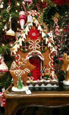 a gingerbread house decorated with christmas decorations