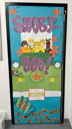 a door decorated with the words sooby doo on it