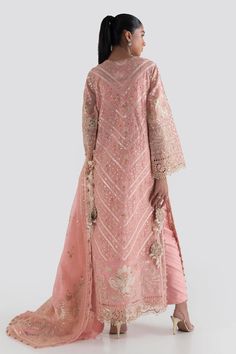 Peach Shade Luxury Pret Pakistani Party Wear Stunning Dress is Crafted with elaborate embroidery and shimmering ornaments, this graceful silhouette marries old world charm. Detailed Description: SKU: PB696 Detailing: Motifs, pearl, dabka, sequins Color: Peach Fabric: Chiffon, net, Silk Design: Fully embellished, Embroidery, Dabka Event: Festive, Party wear Elegant Embroidered Dress With Dabka Work For Wedding, Formal Embellished Organza Embroidered Dress, Elegant Wedding Dress With Dabka Embroidery, Embroidered Embellished Organza Dress For Wedding, Elegant Raw Silk Dress With Intricate Embroidery, Peach Bollywood Dress With Intricate Embroidery, Elegant Pink Dupatta With Intricate Embroidery, Festive Pearl Embroidered Dress For Wedding, Festive Pearl Embroidered Wedding Dress