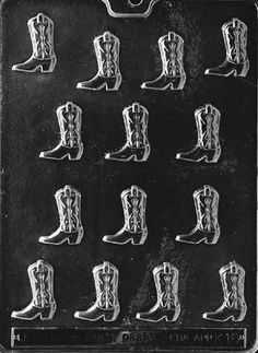 an old black and white photo with boots on it