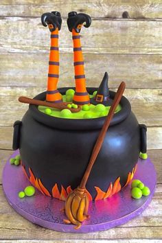 there is a cake that looks like a witch's caulder