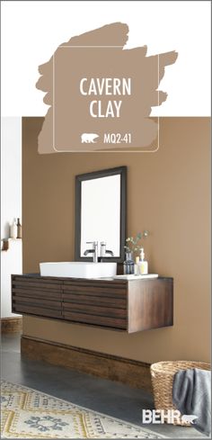 a bathroom with brown walls and a white sink