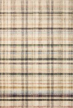 a beige plaid rug with multicolored lines on the side and black, red, yellow, green, blue, white