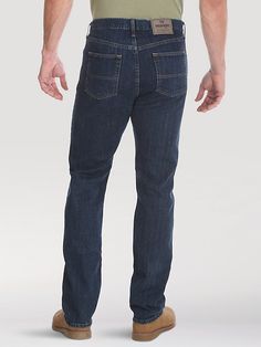 Designed with your day to day in mind, the Wrangler Authentics® men's regular fit flex jean is all about flexibility but means business when it needs to. This versatile jean is made of a solid cotton blend with just a small bit of stretch for to keep you moving on your own terms. With a regular fit, mid rise, and straight leg, this jean will easily become your go-to jean for busy days and low-key days alike. Plus, it comes with our traditional five-pocket styling and iconic details. Moving On, Men's Jeans, Dark Wash Denim, Mens Shirt Dress, Low Key, Dress Shirts, Mens Jeans, The Man, Mid Rise