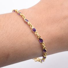 Solid Gold 9k/14k/18k Natural Cut Purple Amethyst Gemstone Adjustable Handmade Gold Bracelet ~ February Month Birthstone ~Gift For Christmas **BRACELET DETAILS** Stone Size - 3x5 MM No of Stone in 19 cm Bracelet - 13 pcs (Please message for customisation) Length- 19 Centimeter Weight- 4.2 gm The Bracelet stamped 9k/14k/18k . We guarantee the quality and the genuine properties of silver and the stone.  About Purple Amethyst :-  Amethyst has healing powers to help with physical ailments, emotional issues, and in Energy Healing and Chakra balancing. Amethyst crystal therapies are primarily associated with physical ailments of the nervous system, the curing of nightmares and insomnia, and balancing the crown chakra. Delivery-  Delivery ( IMPORTANT PLEASE READ)  Our Aim is to dispatch the parce Gold And Purple Bracelet, 14k Gold Bracelets With Gemstones, Gold Amethyst Gemstone Bracelets, Elegant Gold Amethyst Gemstone, Yellow Gold Bracelets With Amethyst Gemstone, Amethyst Yellow Gold Bracelets With Gemstones, Yellow Gold Amethyst Bracelets With Gemstone, Yellow Gold Amethyst Gemstone Bracelets, Yellow Gold Amethyst Bracelet