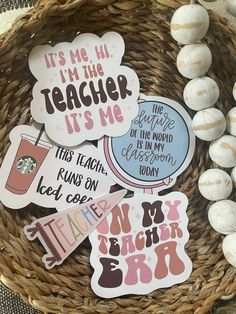 the teacher is me stickers are in a basket next to some white and pink eggs