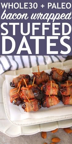 bacon wrapped stuffed dates on a white platter with almonds and text overlay that reads whole 30 + pale bacon wrapped stuffed dates