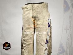 Embrace the timeless elegance of Native Indians' heritage in these luxurious Buckskin Suede Beige Leather Sioux Pants. Adorned with exquisite beadwork and adorned fringe, they're not just garments, but statements of cultural pride and craftsmanship. Whether you're at a powwow or simply seeking an authentic touch, these regalia pants elevate your style with authenticity and respect. * Size Type: Regular * Handmade Yes * Outer Shell Material: Suede and its thickness is 1.5 mm * Style: Western Styl Traditional Pants, Powwow Regalia, Cowboy Pants, Vintage Western Wear, Pant Trouser, Mens Western, Western Leather, Pow Wow, Beaded Fringe