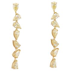 The Following Item we are offering are these Extremely Rare Beautiful 18KT Gold Fine Large Light Fancy Yellow Diamond Dangle Earrings. Each Earring features Rare Gorgeous Glittering Fancy Yellow Diamonds in 18KT Gold. T.C.W. Approx 3CTS!!! The Diamonds are of Exquisite and Fine Quality!! These Gorgeous Earrings are a Rare Sample Piece from a Private Top Manufacturer that sold to Select Five Star Hotels and Fine Jewelry Stores and Comes New With Tags $13,500!!! A Pair of Rare Breathtaking Masterp Luxury Gold Gemstone Danglers, Luxury 22k Gold Dangle Jewelry, Yellow Diamonds, Fancy Yellow Diamond, Diamond Dangle Earrings, Yellow Diamond, Gorgeous Earrings, Jewelry Stores, Fantasia