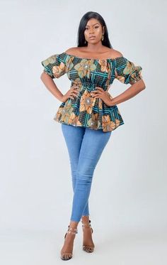 Your Zita off shoulder top is a masterpiece. So accommodating of all body shapes yet extremely stylish. The sleeves can be worn way off shoulder or just about off shoulders. The elastic along the waist line provides added definition and fit. You can't get this wrong. Description 100% cotton African wax Off- shoulder Short sleeves  Peplum Elastic fit waistline and sleeves Fully lined for added comfort  Medium length is 26 inches Sleeve length is 9 inches Made in Cameroon Fabric from Benin Care in African Tops For Women, African Tops, Off Shoulder Top, African Print Fashion, African Inspired, Off Shoulder Tops, African Print, Bell Sleeve, African Fashion