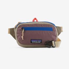 This tough, lightweight 1-liter hip pack carries the bare essentials and stows into its own pocket when not in use. Made with 100% recycled body fabric, lining and webbing. The adjustable strap extends from 8" to 36". Made in a Fair Trade Certified™ factory. Lightweight yet Strong 100% Recycled Fabric Lightweight recycled nylon ripstop is weather-resistant and highly packable Two Pockets for Organization Main compartment has a zippered pocket, plus there's a zippered security pocket for stashing Guy Gifts, Hip Pack, Webbing Belt, Adidas Sneaker, Water Repellent Fabric, Kids Sandals, Black Hole, Recycled Fabric, Fanny Pack