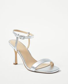 Step into elegance with the Ann Taylor Studio Collection Metallic Skinny Strap Sandals. These sandals are a blend of sophistication and comfort, perfect for enhancing your wardrobe.

- Size: 9
- Color: Silver
- Material: Leather
- Gender: Female
- Features: Open toe, adjustable buckle at side ankle, padded footbed
- Heel Height: 3 1/4 inches

Crafted from premium leather, these sandals feature a sleek metallic finish with skinny straps that add a touch of glamour to any outfit. The adjustable bu Leather Studio, Female Features, Knitted Suit, Comfortable Heels, Silver Material, High Quality Leather, Strap Sandals, Timeless Pieces, Effortless Style