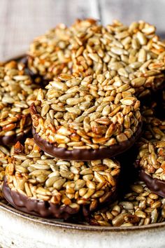 chocolate covered cookies are stacked on top of each other