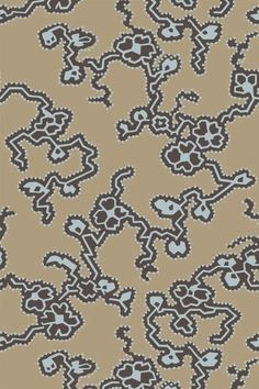 a brown and blue pattern on fabric