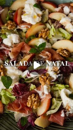 salad with apples, lettuce, walnuts and goat cheese in a bowl