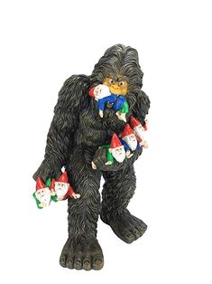 a figurine of a gorilla with christmas decorations